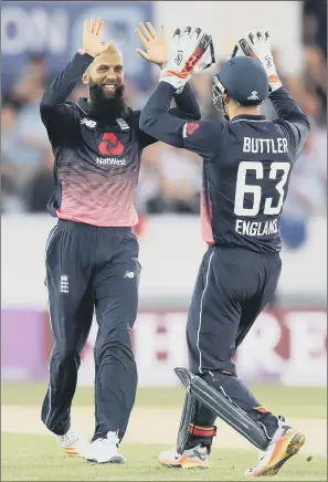  ?? PICTURE: MARTIN RICKETT/PA ?? SERVICE WITH A SMILE: England’s Moeen Ali celebrates with Jos Buttler after taking the wicket of South Africa’s Chris Morris in their victory over South Africa at Headingley.