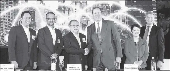  ?? JOEY VIDUYA ?? Photo shows (from left) Juan Victor Hernandez, senior vice-president and head of enterprise for PLDT; Joachim Horn, PLDT-Smart chief technology and informatio­n advisor; Manuel V. Pangilinan, PLDT-Smart chairman and CEO; Chuck Robbins, chairman and CEO, Cisco; Miyuki Suzuki, president Asia Pacific, Japan and China at Cisco; and Chris Heckscher, Cisco SVP for CX, Asia Pacific, Japan and greater China.