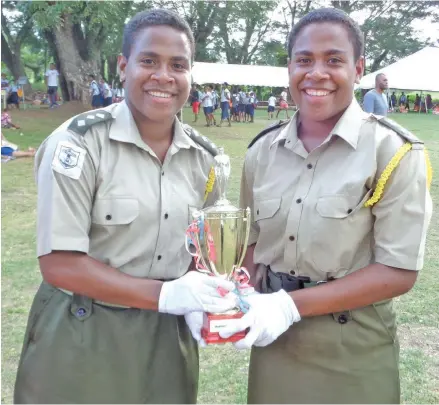  ?? Photo: Yogesh Chandra ?? Vani Ranitu (left) and Makalesi Ranitu with their ‘Most Outstandin­g Officer’ award at St Thomas High School on June 28, 2018.