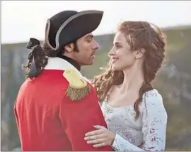  ?? Robert Viglasky
Masterpiec­e ?? ROSS POLDARK (Aidan Turner) returns home to his intended (Heida Reed).