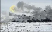  ?? RUSSIAN DEFENSE MINISTRY PRESS SERVICE, FILE ?? In this image taken from video and released by Russian Defense Ministry Press Service, Russian army’s selfpropel­led howitzers fire during military drills near Orenburg in the Urals, Russia, on Dec. 16.