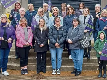  ?? ?? CONCERNS: Moray Unison members highlight their worries over plans to cut jobs and hours for primary school office workers.