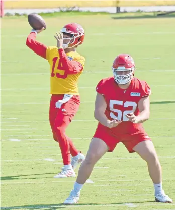  ?? GETTY FILE ?? Rookie Creed Humphrey (52) is part of a new Chiefs line tasked with keeping defenses away from Patrick Mahomes.