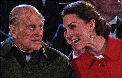  ??  ?? Glint in his eye: Prince Philip chats to the Duchess of Cambridge during the celebratio­n of his wife’s birthday