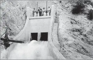  ?? Security First National Bank Los Angeles ?? THE LOS Angeles Aqueduct, which opened in 1913, was championed by The Times. The project infamously dried up rich Owens Valley farmland and uprooted many of its inhabitant­s.