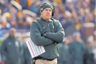  ?? Paul Sancya, Associated Press file ?? Mark Dantonio retired as Michigan State’s all-time winningest football coach. He directed the Spartans to a 114-57 record in 13 seasons.