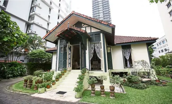  ??  ?? The bungalow is now dwarfed by tall buildings so its garden now receives less morning sun, says Louise. — Photos: ST/ANN