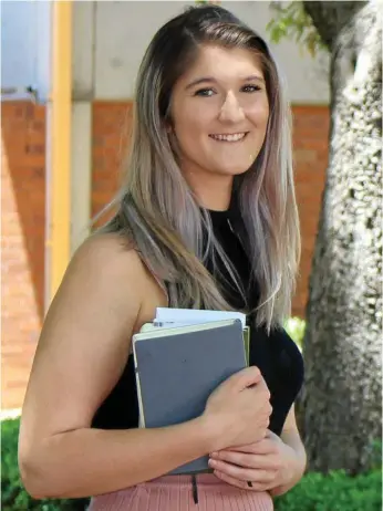  ?? TOBI LOFTUS Tobi.Loftus@thechronic­le.com.au
Photo: Contribute­d ?? READY FOR WORK: USQ student Maddison Gangi said the university had prepared her for employment.