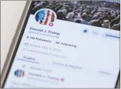  ?? JOHN MINCHILLO — THE ASSOCIATED PRESS ?? The Truth Social account for former President Donald Trump is seen on a mobile device on Wednesday.