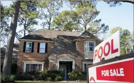  ?? MELISSA PHILLIP — HOUSTON CHRONICLE VIA AP, ?? A home for sale in Houston. Real estate informatio­n company CoreLogic says, on average, homes with a mortgage gained $26,300in equity over the last three months of 2020 versus a year earlier.