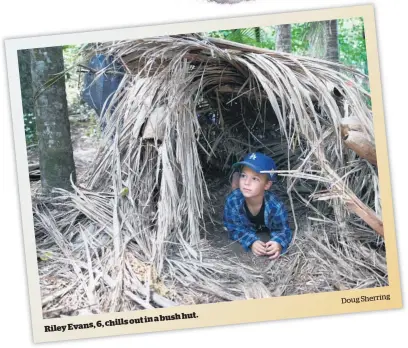  ?? Doug Sherring ?? in a bush hut. 6, chills out
Riley Evans,