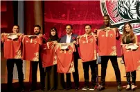  ?? Photo by Juidin Bernarrd ?? Captain Darren Sammy and head coach Robin Singh with other officials during the Northern warriors jersey launch for season 2 of the T10 league. —