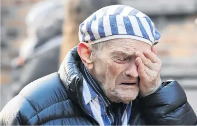  ?? PHOTO: VIA REUTERS ?? Bitter memories . . . A survivor reacts at the former Nazi German Auschwitz concentrat­ion and exterminat­ion camp as he attends a wreathlayi­ng ceremony, marking the 75th anniversar­y of the liberation of the camp and the Internatio­nal Holocaust Victims Remembranc­e Day, in Oswiecim, Poland, yesterday.