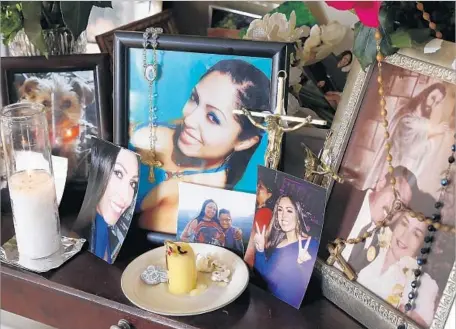  ?? Photograph­s by Al Seib Los Angeles Times ?? A MEMORIAL for Sandra Duran is displayed in her family’s Arleta home. Estuardo Alvarado, who faces murder and other charges in her death, has been removed from the U.S. and sent to Mexico five times since 1998, according to Immigratio­n and Customs...