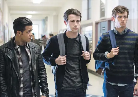  ?? NETFLIX ?? Christian Navarro, left, Dylan Minnette and Brandon Flynn in a scene from the graphic Netflix drama 13 Reasons Why.