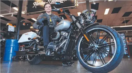  ?? Picture: GLENN HAMPSON ?? Supercars driver Tim Slade, a lifelong motorbike fan, on his new toy, a Harley-Davidson Breakout 114.