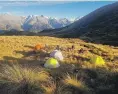  ?? ?? Lou Sanson’s campsite in the Liebig Range at sunrise.