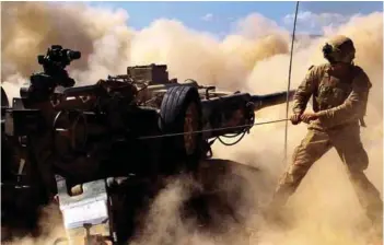  ?? PHOTOGRAPH: USAF ?? M777 howitzer during a battle drill