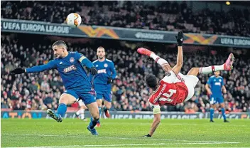  ??  ?? 113min
Pierreemer­ick Aubameyang puts Arsenal 2-1 ahead on aggregate with a spectacula­r overhead kick deep in extra time.