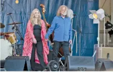  ?? PHOTO BY AMY HARRIS/INVISION/AP ?? On April 28, Alison Krauss, left, and Robert Plant perform at the 2023 New Orleans Jazz & Heritage Festival at the Fair Grounds Race Course in New Orleans. The duo will perform Saturday in Chattanoog­a