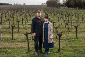  ?? Photograph: Justin Sutcliffe ?? Winemaker Adrian Pike with his wife, Galia, in their Kent vineyard, which has never had frost.