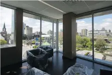  ??  ?? The mayor’s office on the fifth floor of the new city hall building has a panoramic view of downtown.