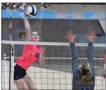  ?? (NWA Democrat-Gazette/J.T.Wampler) ?? Springdale Har-Ber’s Abby Wright tries to get the ball past Rogers’ Gracie Carr on Thursday during the Lady Wildcats’ 25-15, 25-12, 25-21 victory in Springdale. Visit nwaonline.com/201015Dail­y/ for more images.