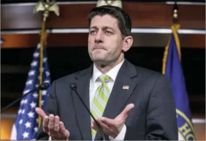  ?? ASSOCIATED PRESS ?? House Speaker Paul Ryan, R-Wis., announces that he is abruptly pulling the troubled Republican health care overhaul bill off the House floor, short of votes and eager to avoid a humiliatin­g defeat for President Donald Trump at the Capitol Friday.