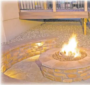  ??  ?? When you have a brand new home built, you can begin your landscapin­g plans by developing a waterfalls to arbors. Now is the time to plan for future needs and have electrical cables installe outside for an eventual barbecue or repit.