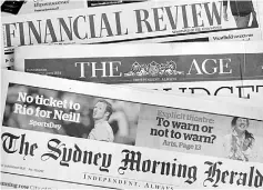  ??  ?? This file photo shows the front pages of some newspaper mastheads owned by media group Fairfax in Sydney. Fairfax, a takeover target of US private equity giant TPG Capital and investment firm Hellman & Friedman, said last month it was axing a quarter...