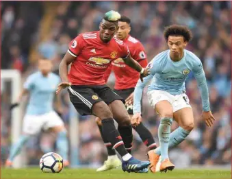  ??  ?? Paul Pogba (left) inspired United to a comeback victory over City in April