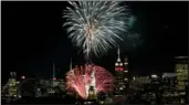  ?? PROVIDED TO CHINA DAILY ?? Fireworks light up the sky between the Statue of Liberty and Empire State Building in New York City in a show sponsored by Briggs Inc in June 2017.