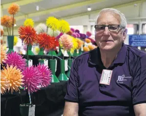  ?? PHOTO: LAURA SMITH ?? Dahlia devotee . . . The Southland Dahlia Circle’s Walter Jack convened this year’s South Island National Dahlia Show.