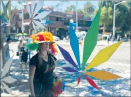  ?? Ana Venegas For The Times ?? THE FOUR shops formed the “West Hollywood Originals” alliance with a rainbow pot leaf as its logo. They say they’re being shut out of the recreation­al market.