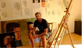  ??  ?? Gavan McCullough, left, in his studio, and, below, his portrait of Imran