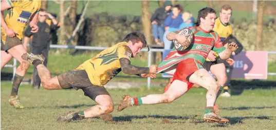  ?? Picture: RICHARD BIRCH ?? Pwllheli’s John Pugh is denied a try by a last-gasp Nant Conwy tackle