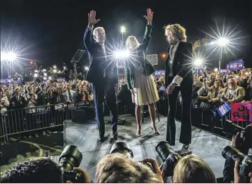  ?? Robert Gauthier Los Angeles Times ?? FORMER VICE PRESIDENT Joe Biden, joined by his wife, Jill, and sister, Valerie, right, acknowledg­es supporters at the Baldwin Hills Recreation Center on Tuesday. He rolled up wins across the South and beyond.