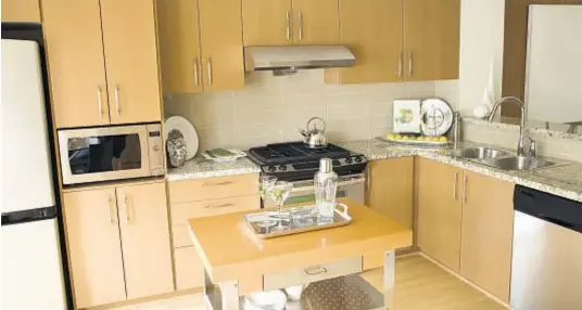  ?? Photo courtesy of Content That Works ?? Potential home buyers look for a versatile, bright, storage-filled kitchen.