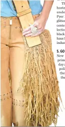  ??  ?? FRINGE IS IN: A heavily fringed bag at the Michael Kors Collection Spring 2019 Runway Show on Sept. 12.