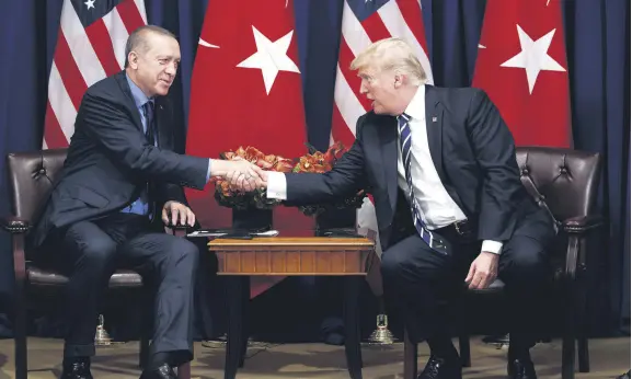  ??  ?? President Erdoğan (L) shakes hands with U.S. President Trump during a meeting at the Palace Hotel during the United Nations General Assembly, New York, Sept. 21, 2017.