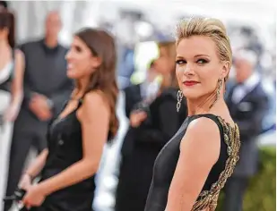  ?? Mike Coppola / Getty Images ?? Megyn Kelly attends the Costume Institute Gala at Metropolit­an Museum of Art in New York. The TV-news star acknowledg­es the role clothes play in her life.