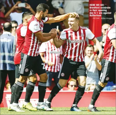  ?? PICTURE: Action Images ?? HERE WE GO: Brentford celebrate in their opening day 5-1 win against Rotherham