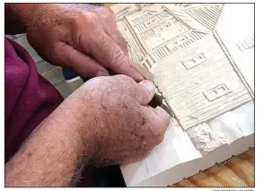  ?? COURTESY PHOTO ?? An artist works on a wood carving at the Eureka Springs School of the Arts. The “Mad Hatter Ball” to benefit the nonprofit organizati­on is set for Oct. 20 at the 1886 Crescent Hotel.