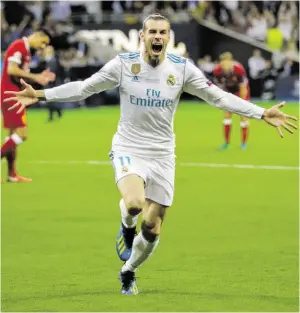  ?? BILD: SN/AP ?? Gareth Bale war der Matchwinne­r für Real mit zwei Toren.