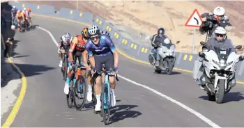  ?? — AFP photo ?? Spanish Ruben Almeida Guerreiro of the Movistar Team leads before winning the fourth stage of 2023 Saudi Tour, from Maraya to Skyviews of Harrat Uwayrid.
