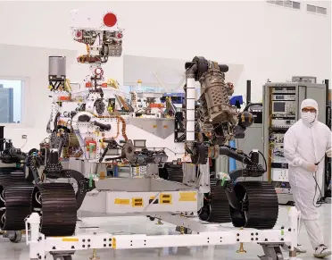  ??  ?? The Mars 2020 Rover is on show during a media tour at NASA’s Jet Propulsion Laboratory in Pasadena. The rover, which will take off in a few months, will not only search for possible traces of past life, it will also serve as a ‘precursor to a human mission to Mars.’