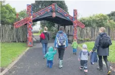  ??  ?? The group of explorers approachin­g the pā entrance. PHOTO: Supplied.