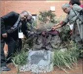  ?? PICTURE: ZANELE ZULU/ AFRICAN NEWS AGENCY (ANA) ?? Comfort Khumalo with his wife Philisiwe during the opening of the memorial fountain to their late daughter Zolile who was killed in her room at a Mangosuthu University of Technology off-campus residency.