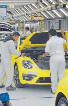  ?? FOTO: DPA ?? VW-Werk im mexikanisc­hen Puebla: Ein Scheitern der Nafta-Gespräche würde auch die deutsche Automobili­ndustrie hart treffen.