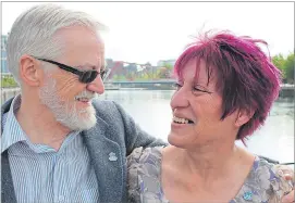  ??  ?? Joy Watson, 57, who has early-onset Alzheimer’s, with husband Tony